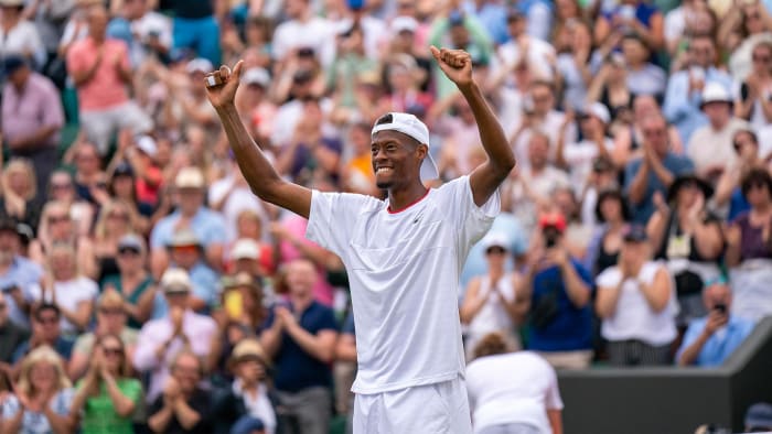 Christopher Eubanks celebrates after defeating Stefanos Tsitsipas